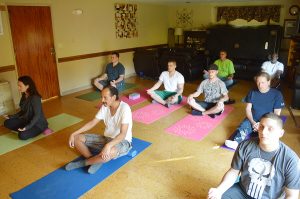 TPH residents and staff in meditation.